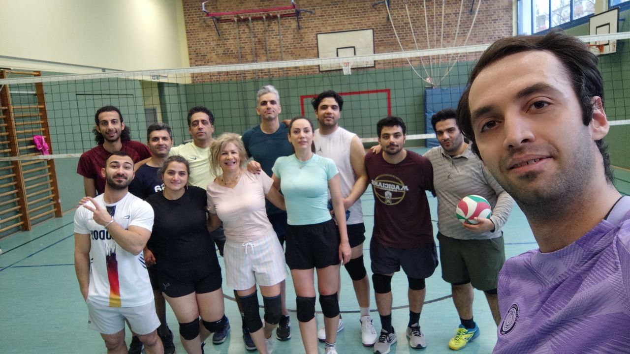 Mobin Shahidi with a volleyball team